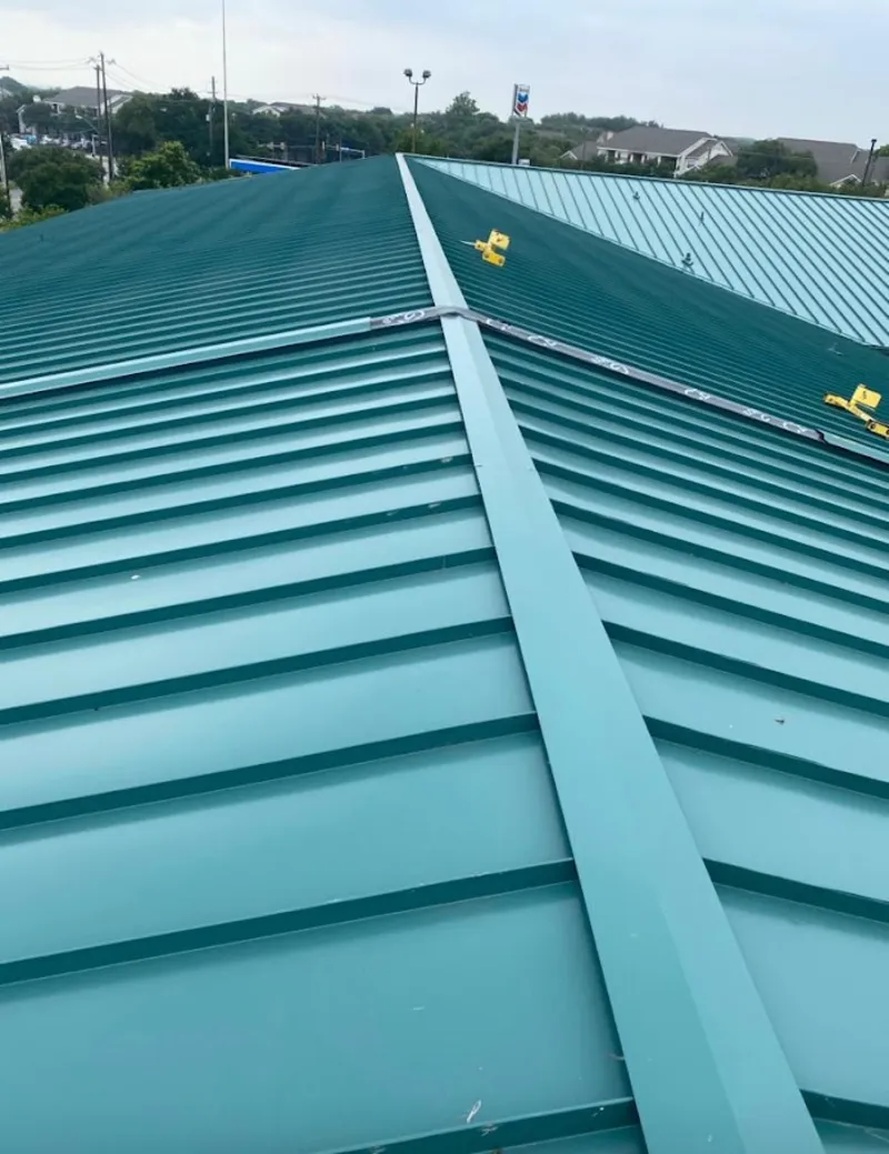 Green commercial metal roof ridge and valley for Metal Roof Repair in Russellville